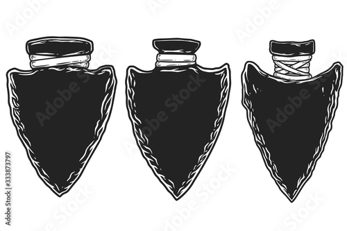 Set of illustrations of ancient stone arrowheads. Design element for emblem, sign, poster, t shirt. Vector illustration photo