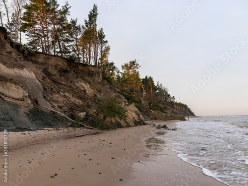 sea landscape. steep shore under the influence of rain and wind
