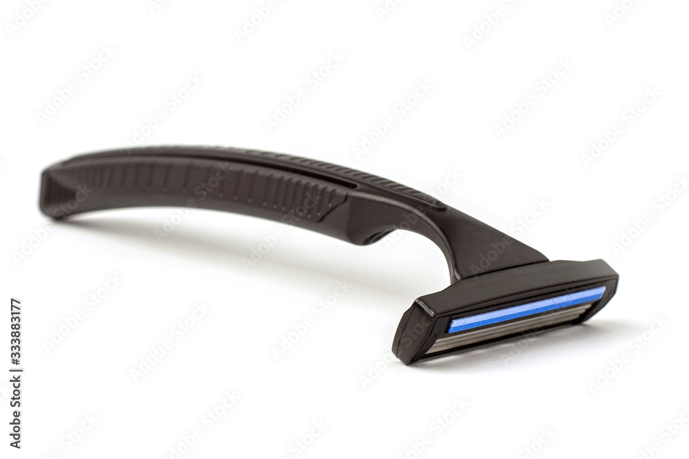 Black three-blade safety razor isolated on a white background. Black three-blade safety razor isolated on a white background.