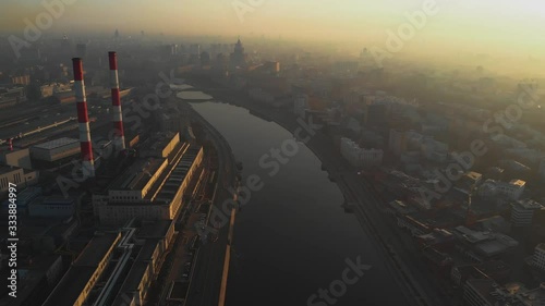 Berezhkovskaya embankment aerial view shot in the early morning on the background of a haze-covered city. Moscow during the pandemic.