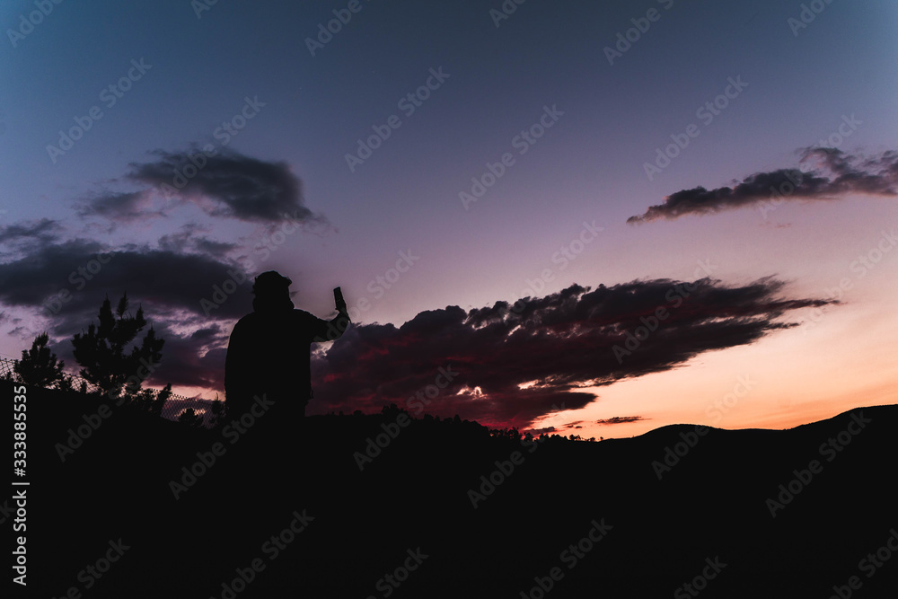 taking photograph of sunset