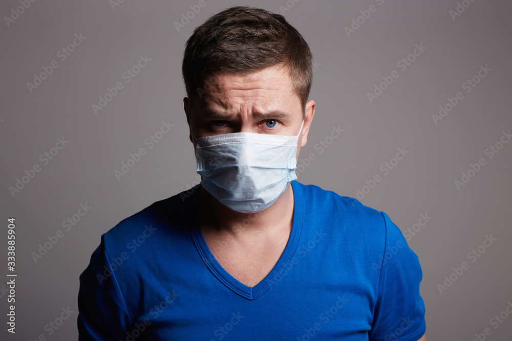 Young Man in Mask. medical masked boy. medicine Young Man in Mask. medical masked boy. medicine