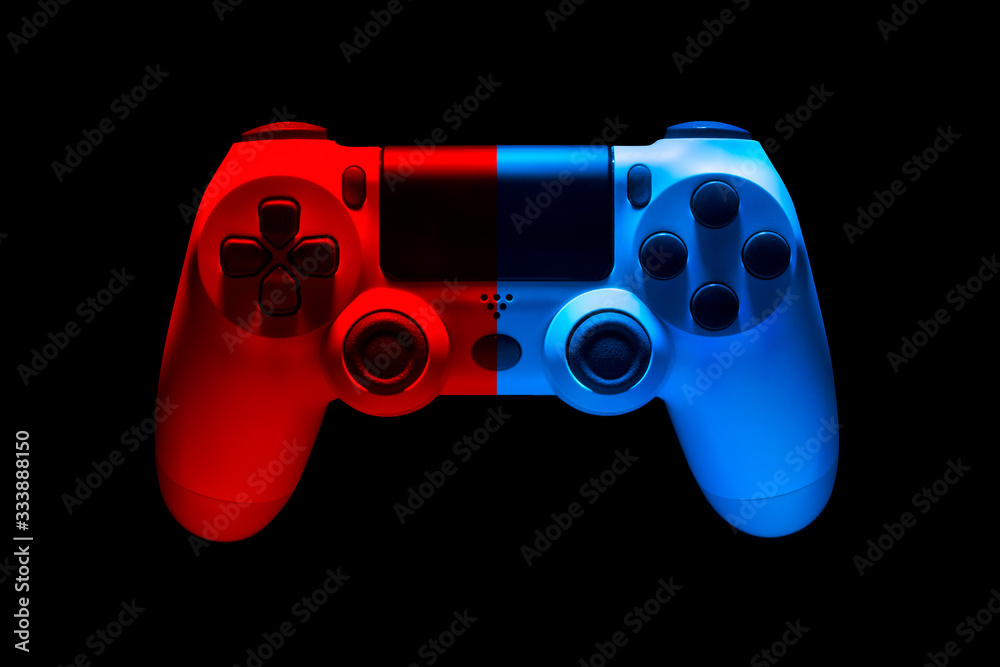 White video game joystick gamepad in blue and red neon lights isolated on black White video game joystick gamepad in blue and red neon lights isolated on black