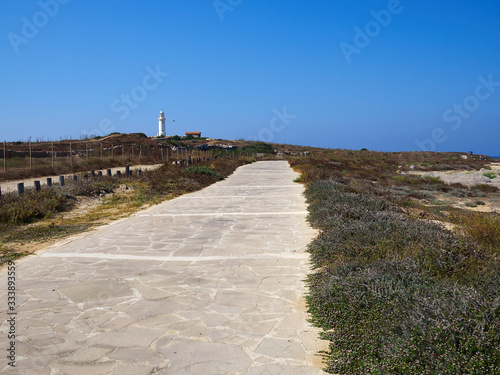 Famous coastal broadwalk path surrounding the archaeological park Paphos Cyprus photo