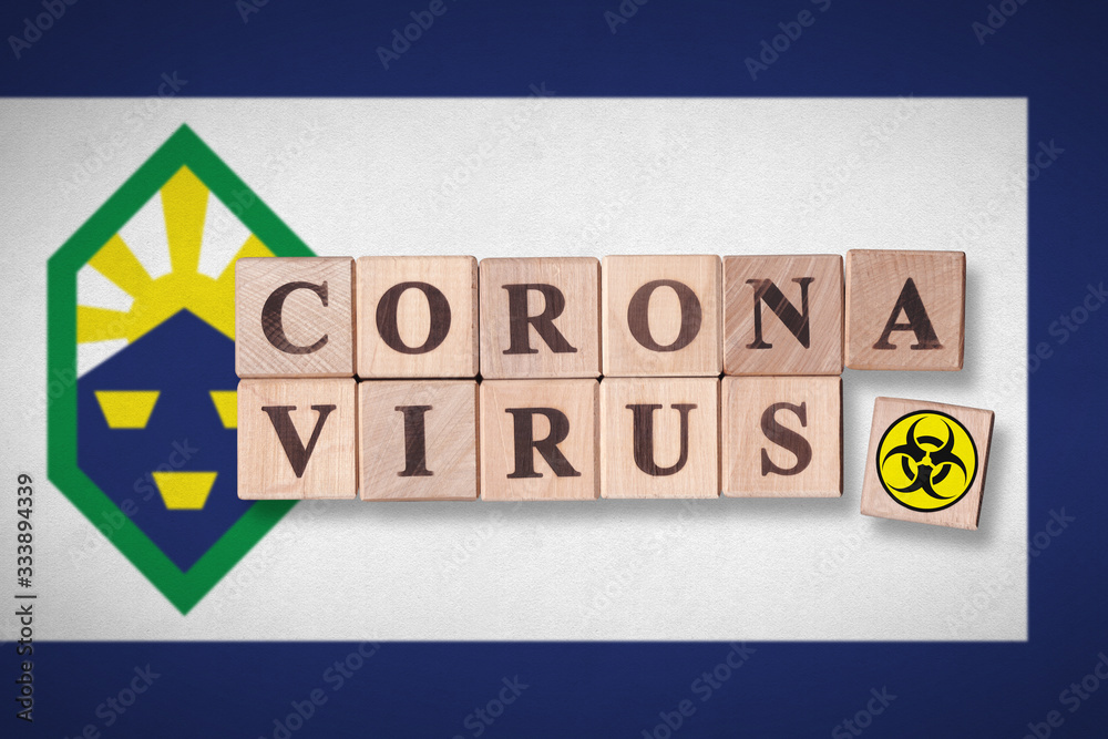 Flag of Colorado Springs and wooden blocks with letters spelling CORONAVIRUS and quarantine symbol on it. Novel Coronavirus (2019-nCoV) concept for an outbreak occurs in Colorado Springs, US. Flag of Colorado Springs and wooden blocks with letters spelling CORONAVIRUS and quarantine symbol on it. Novel Coronavirus (2019-nCoV) concept for an outbreak occurs in Colorado Springs, US.
