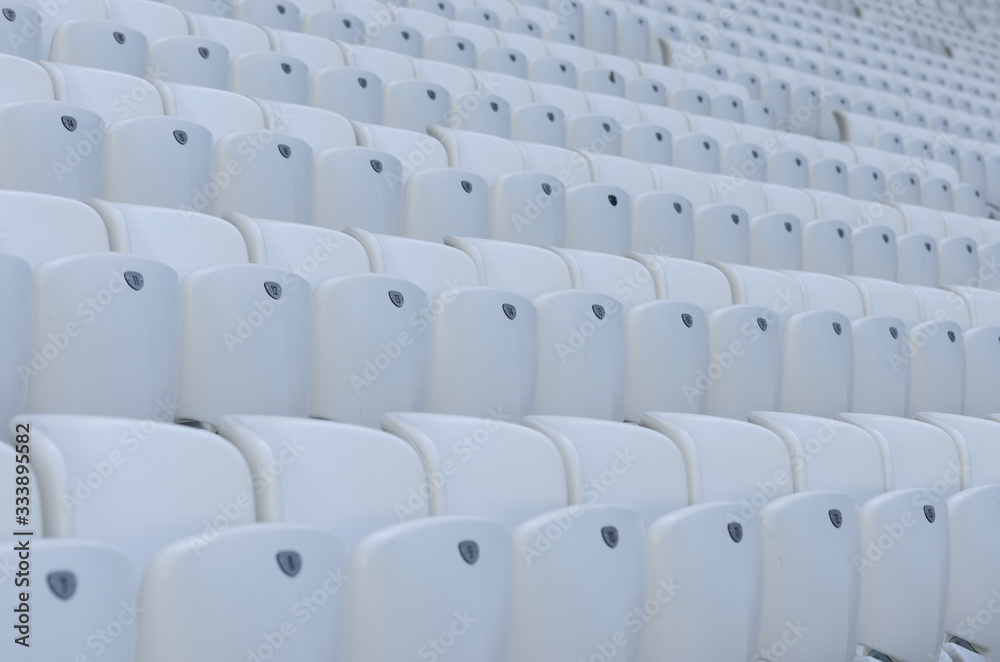 Fototapeta premium Empty white seats in the stadium before the match
