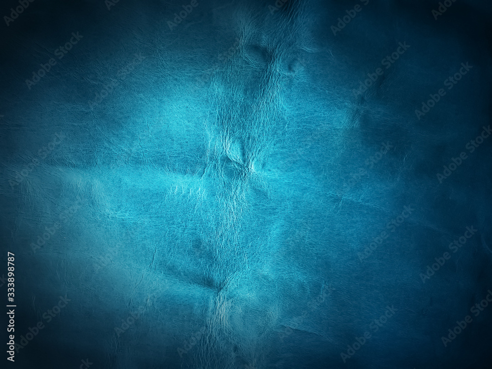 Fototapeta premium Genuine Leather. Sewing a purse. Leather work. Tools for sewing bags, wallets, clutches. Stitching. Manual sewing of the product. The manufacture of leather products.