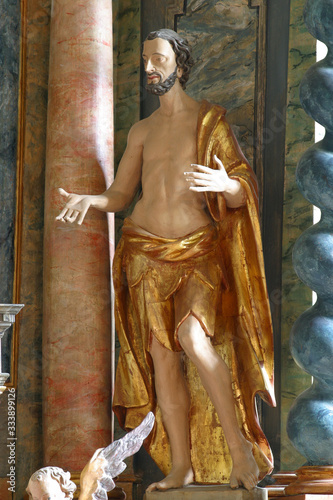 Saint Dismas, statue on the altar in the Holy Trinity Parish Church in Klenovnik, Croatia photo