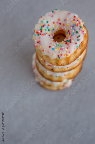 donuts on grey background seen from above