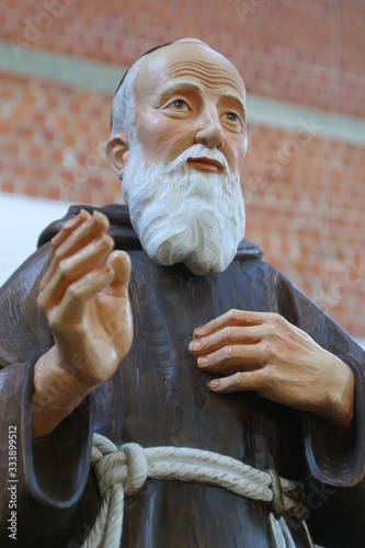 Saint Leopold Mandic, statue in the St. Leopold Mandic Parish Church in Dubrava, Zagreb, Croatia photo