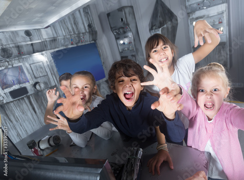  children play in the quest room of a inscrutable bunker