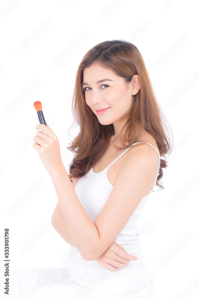 Beauty of portrait asian woman applying make up with brush of cheek isolated on white background, beautiful of girl holding blusher, skincare and cosmetic concept. Beauty of portrait asian woman applying make up with brush of cheek isolated on white background, beautiful of girl holding blusher, skincare and cosmetic concept.