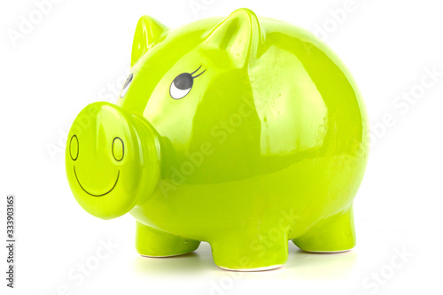 Green, green piggy bank isolated on a white background. Budget saving concept.