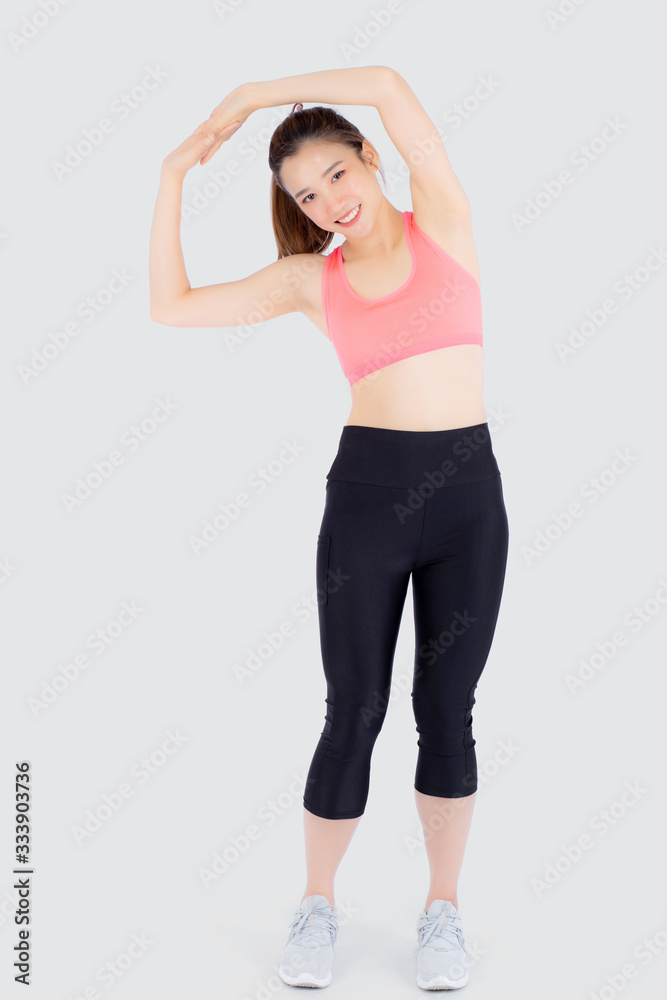 Beautiful young asian woman in sport standing stretch muscle arm workout with healthy isolated on white background, girl wear shape fit warm up and exercise and yoga for health, wellness concept. Beautiful young asian woman in sport standing stretch muscle arm workout with healthy isolated on white background, girl wear shape fit warm up and exercise and yoga for health, wellness concept.