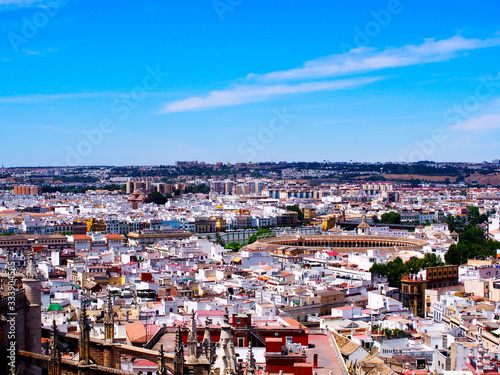 View of the city from the highest point of Seville, the Giralda tower. Seville Catedral. 08.2012.