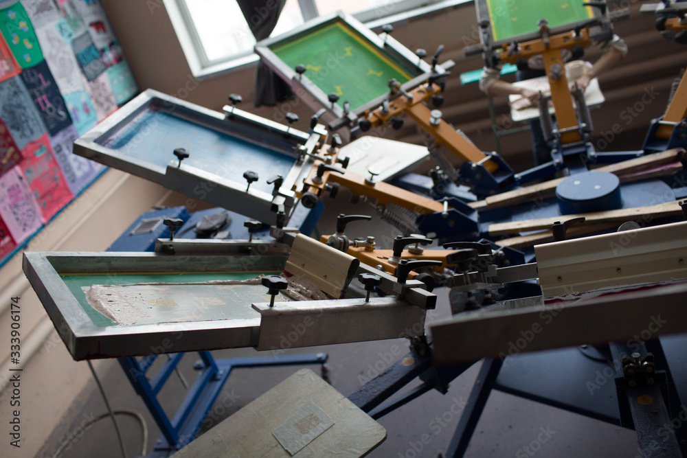 Silk screen printing. Serigraphy. Color paints and fabric. Carousel