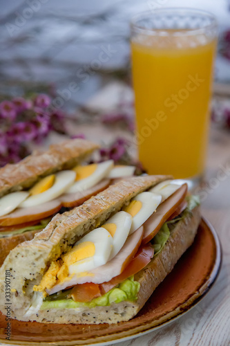 sandwiches with orange juice