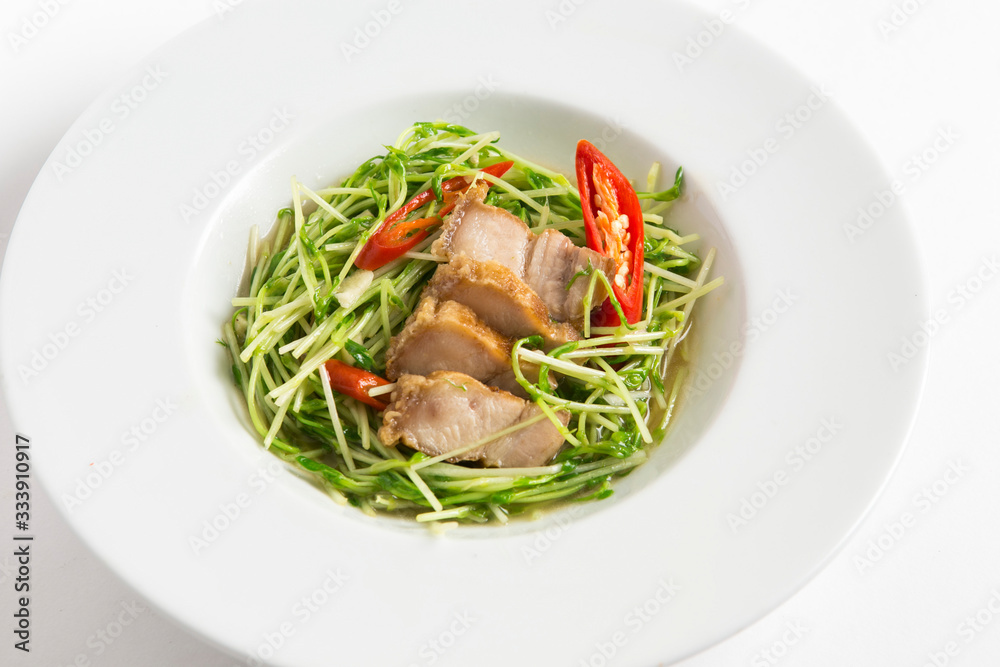 stir fried sunflower seedling with crispy pork 