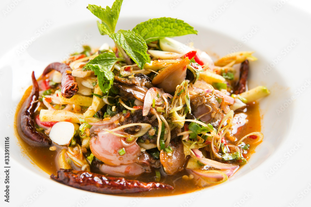 thai herb spicy clams salad serve in white plate thai herb spicy clams salad serve in white plate