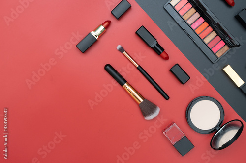set decorative cosmetics on black and red
