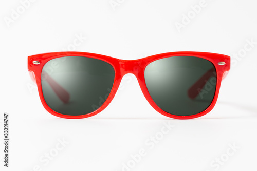red plastic sunglasses isolated
