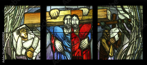 Simon of Cyrene carries the cross, stained glass window by Sieger Koder in Chapel in the Jesuit cemetery in Pullach, Germany