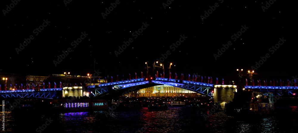 Saint Petersburg drawbridge with neon lighting at night