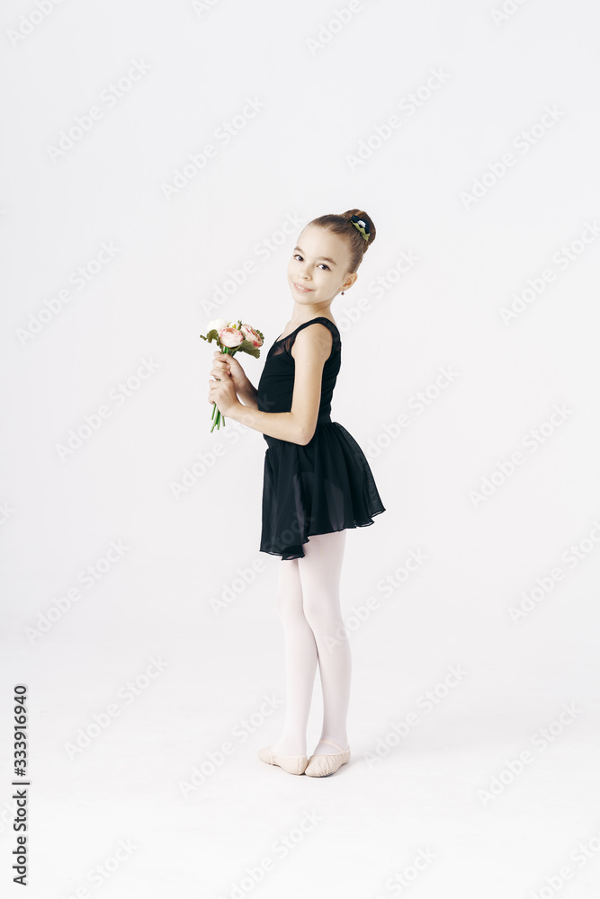 Delicate girl ballerina dancing on white background Delicate girl ballerina dancing on white background