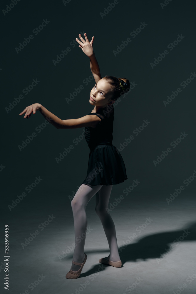 Delicate girl ballerina dancing in studio Delicate girl ballerina dancing in studio