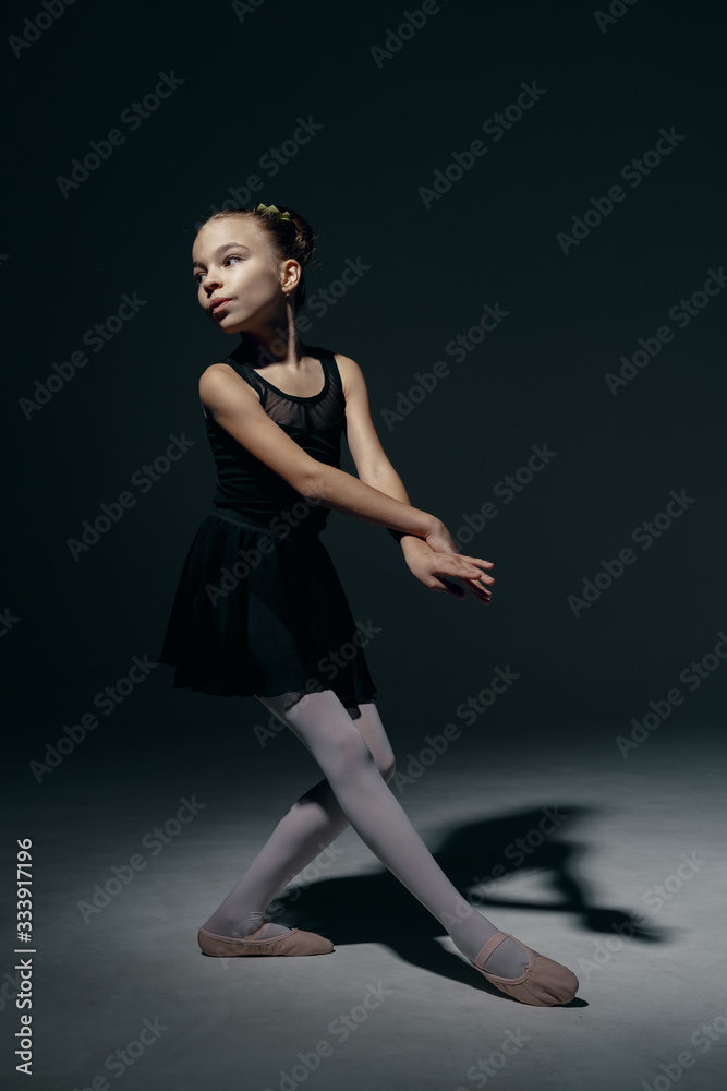 Delicate girl ballerina dancing in studio Delicate girl ballerina dancing in studio