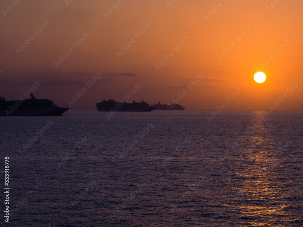 Cruise ships in the open ocean at the quarantine time during COVID-19 virus epidemic Cruise ships in the open ocean at the quarantine time during COVID-19 virus epidemic