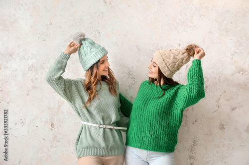 Young women in warm sweater...