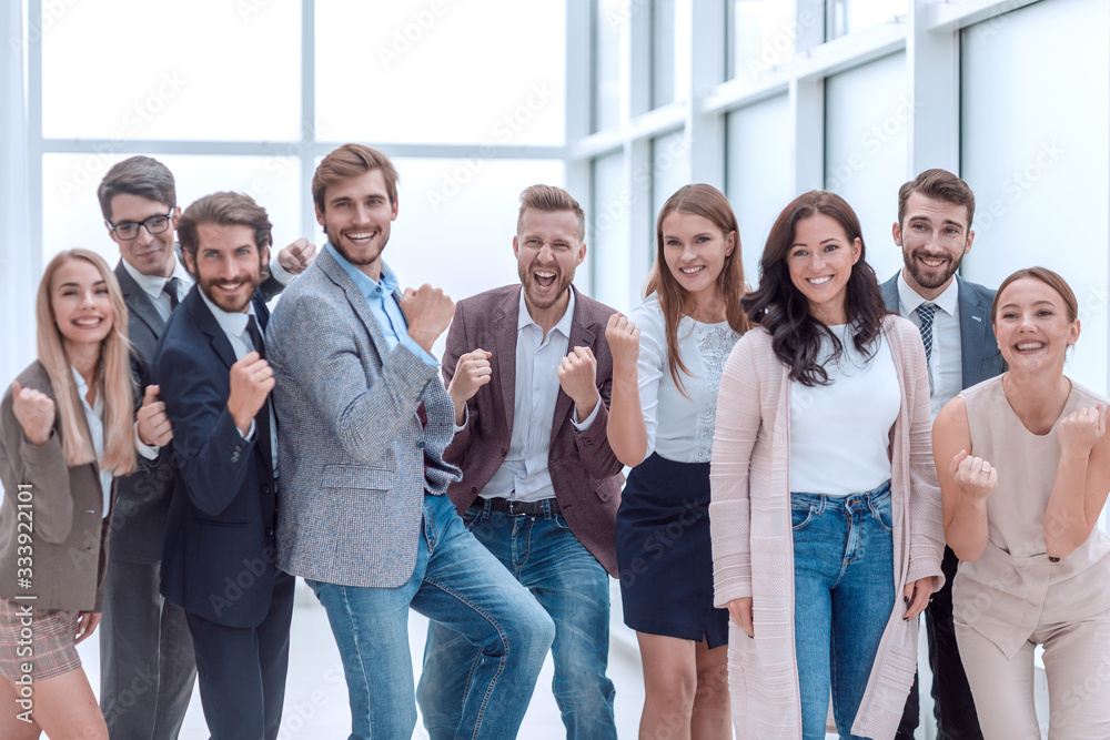 © ASDF - close up. a group of jubilant young people standing together © ASDF - close up. a group of jubilant young people standing together