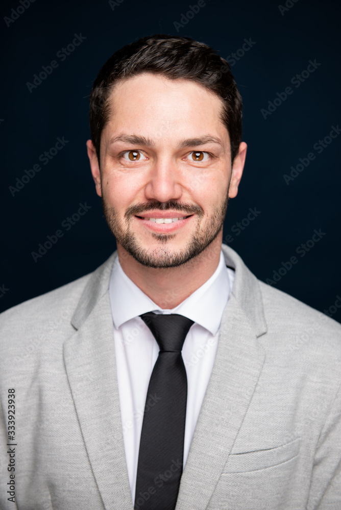 Portrait of business young handsome male smiling to camera Portrait of business young handsome male smiling to camera