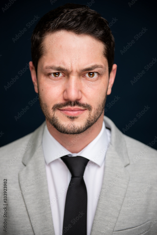 Portrait of business young handsome male posing to camera Portrait of business young handsome male posing to camera