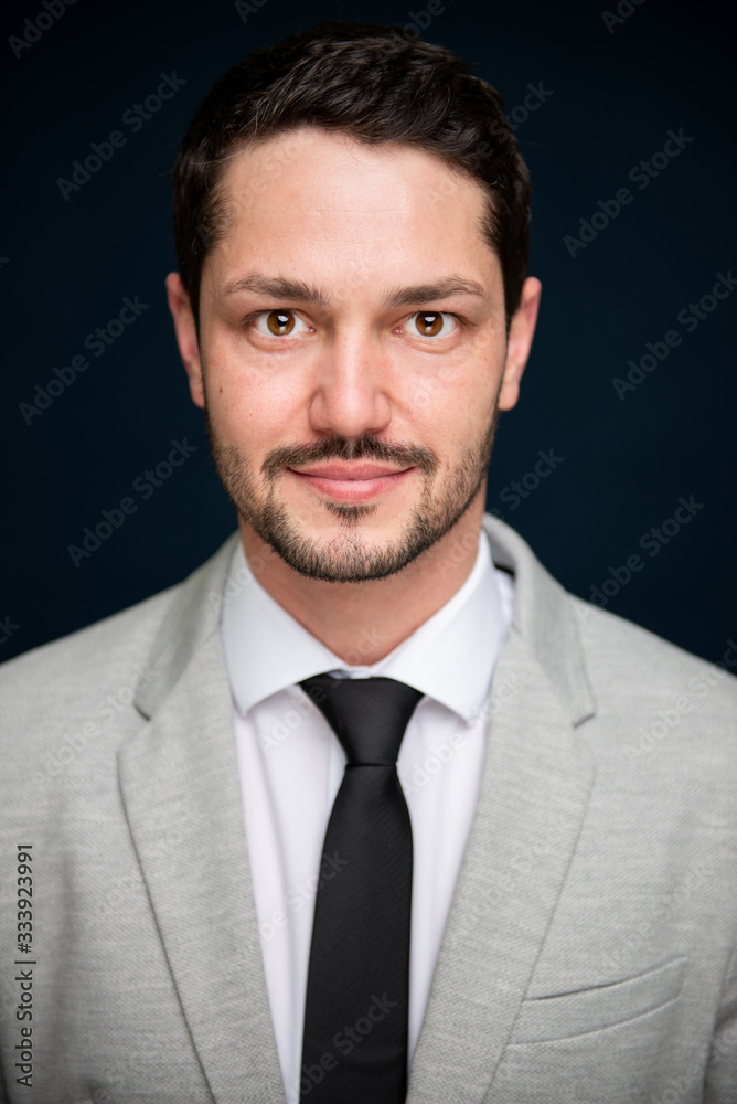Portrait of business young handsome male smiling to camera Portrait of business young handsome male smiling to camera