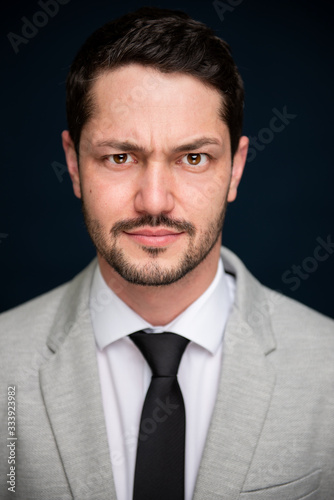 Portrait of business young  handsome male posing to camera