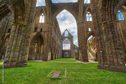 The ruins of Tintern Abbey  founded by Walter de Clare  Lord of Chepstow  on 9 May 1131. It is situated adjacent to the village of Tintern in Monmouthshire  Wales  UK.