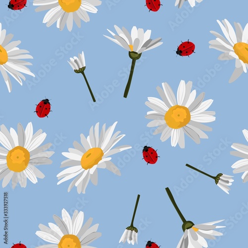Seamless pattern of camomile (chamomile), cornflowers with ladybird on blue. 