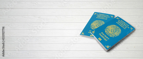 Kazakhstan Passports on Wood Lines Background Banner with Copy Space - 3D Illustration