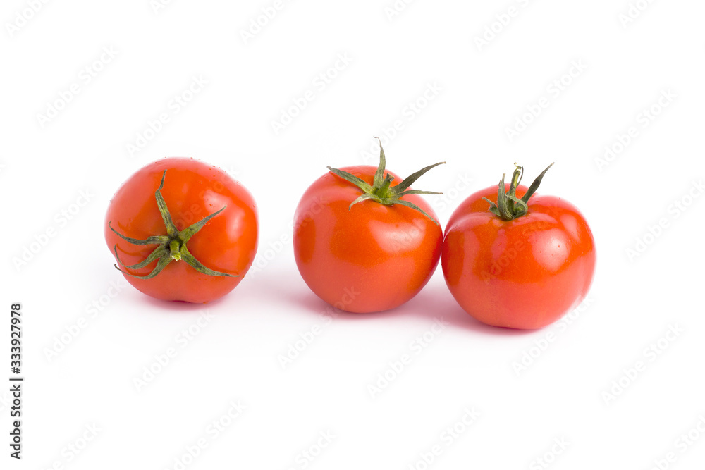 Fresh tomatoes isolated on white background. Three red ripe tomatoes isolated on white background. Tomatoes on white background. Fresh tomatoes isolated on white background. Three red ripe tomatoes isolated on white background. Tomatoes on white background.