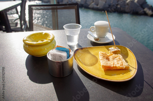 Photo Amazinf view  on Cake and coffee under thew lid at Salerno
