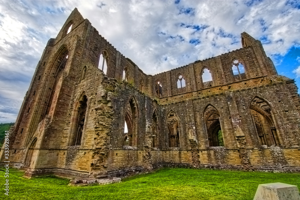 The ruins of Tintern Abbey, founded by Walter de Clare, Lord of Chepstow, on 9 May 1131. It is situated adjacent to the village of Tintern in Monmouthshire, Wales, UK.