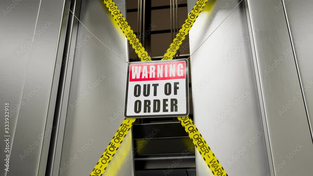 Out of order warning sign in front of a broken elevator door opened. 4KHD