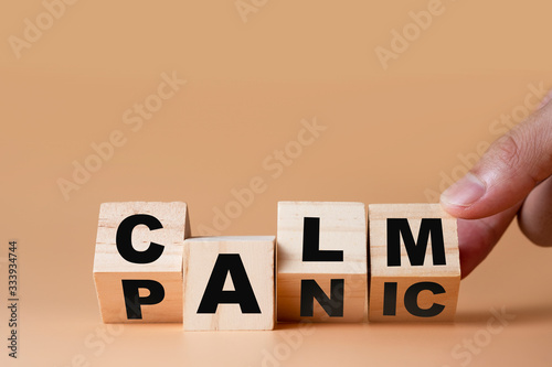 Canvas-taulu Hand flipping wooden cubes for change wording Panic   to  Calm