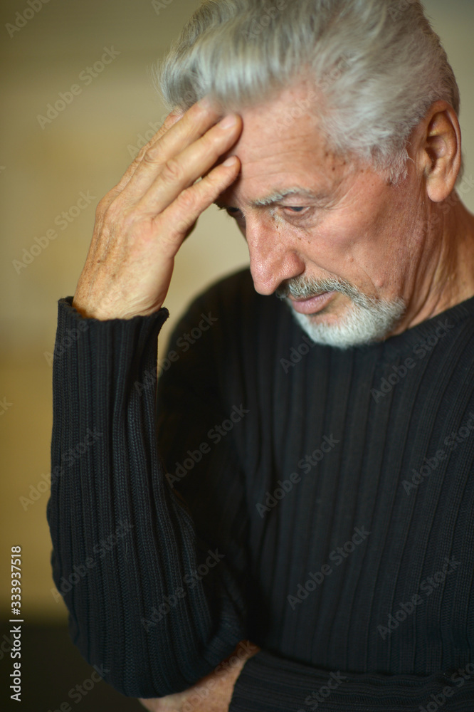 Portrait of thoughtful senior man at home Portrait of thoughtful senior man at home