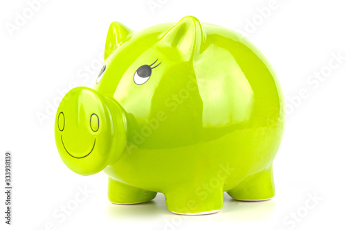 Green, green piggy bank isolated on a white background. Budget saving concept.