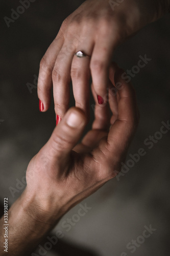 man and woman hands close up