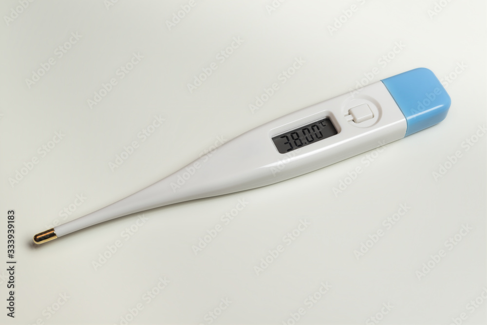 White Thermometer shows a temperature of 38 Celsius on white background.