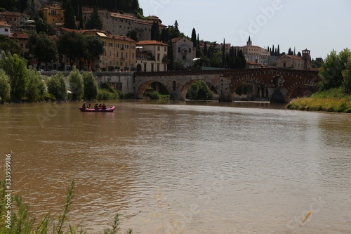 Verona - Adige panorama and rafts on the Adige.